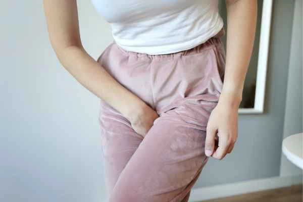 woman running for the toilet because of urinary incontinence Horley